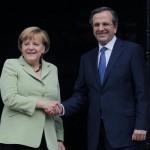 Atene, giacca color pistacchio Angela Merkel