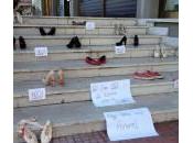 Fabiana Luzzi, scarpe fiocco rosso dire “no” alla violenza