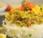 Bocconcini pollo curry frutti tropicali risotto alle erbe aromatiche