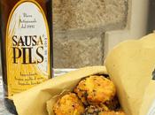 Arancini riso allo zafferano uvetta, caprino sesamo nero